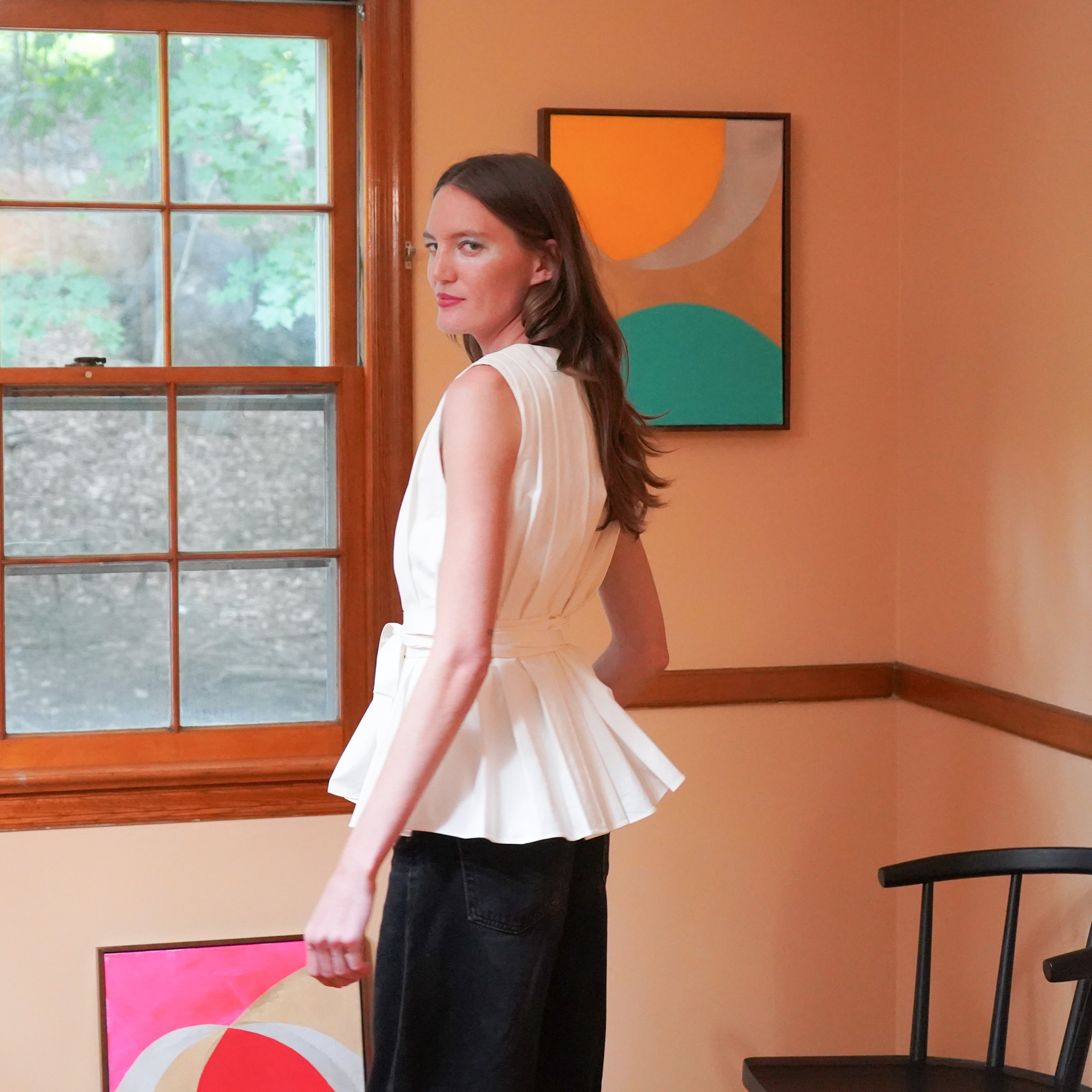  Sleeveless cream peplum top