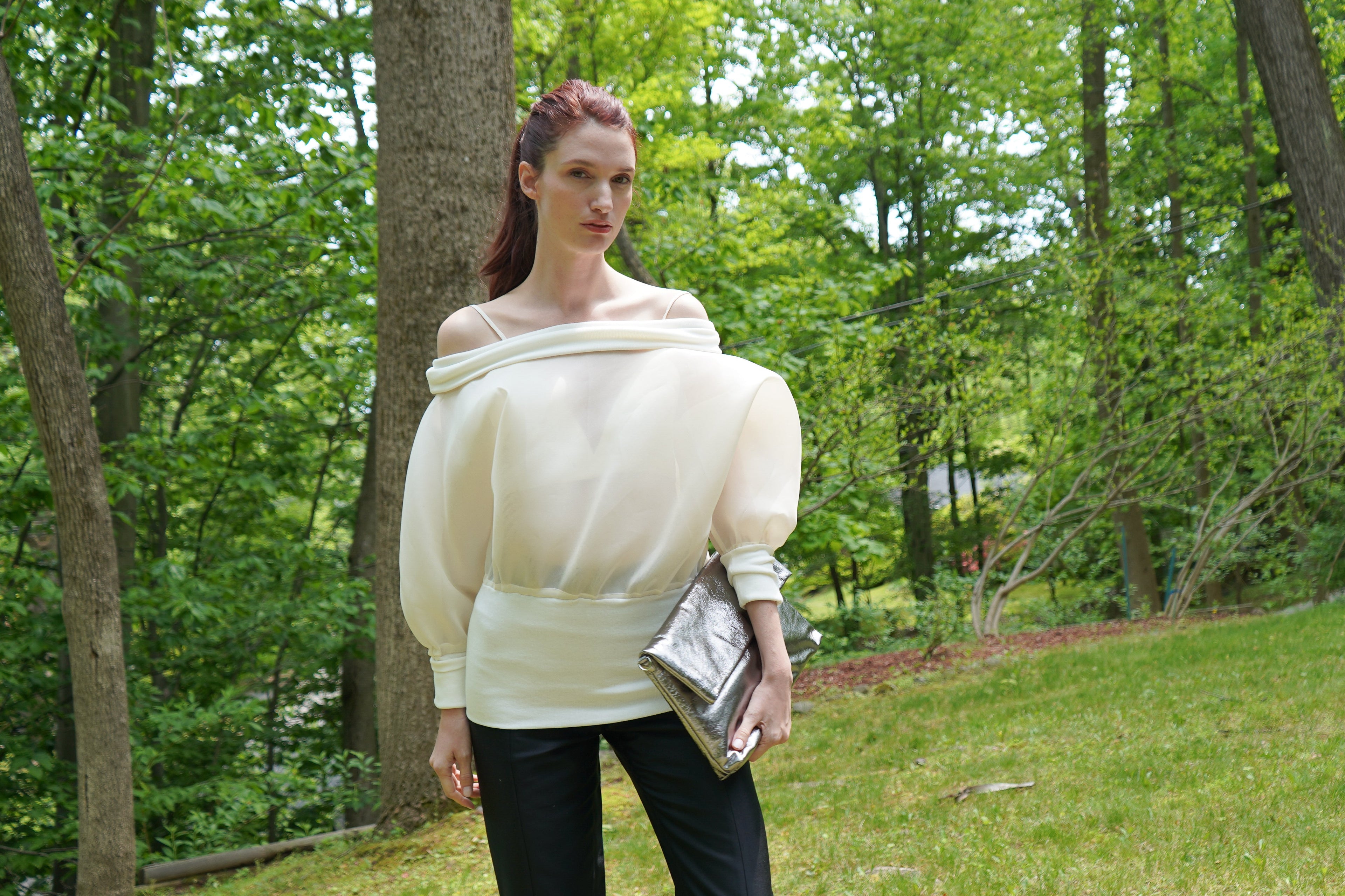 Evelyn clutch texture detail — women's soft slouchy handbag close-up
