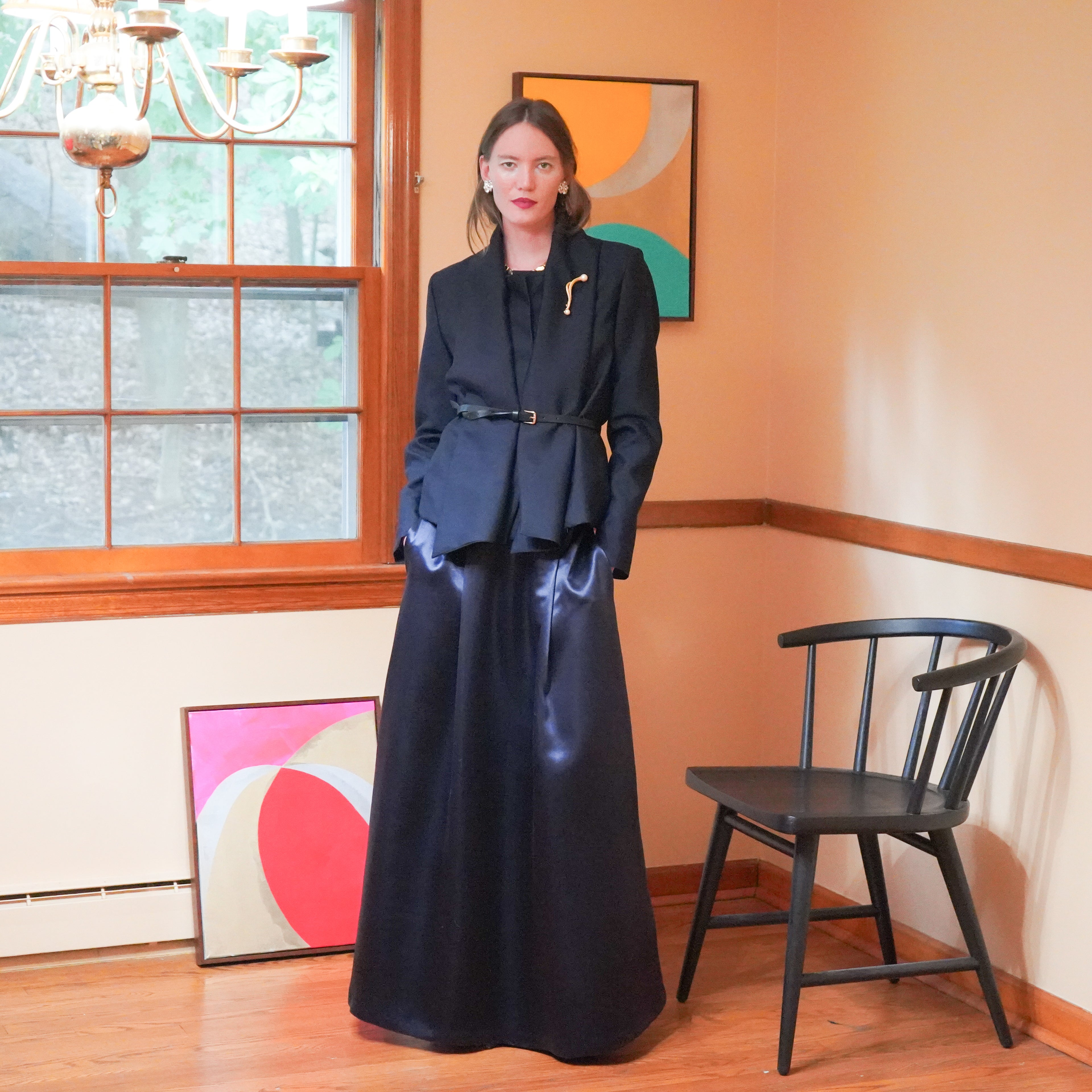 Dark navy wrap-style blazer with a draped scarf collar and maxi charmeuse skirt.