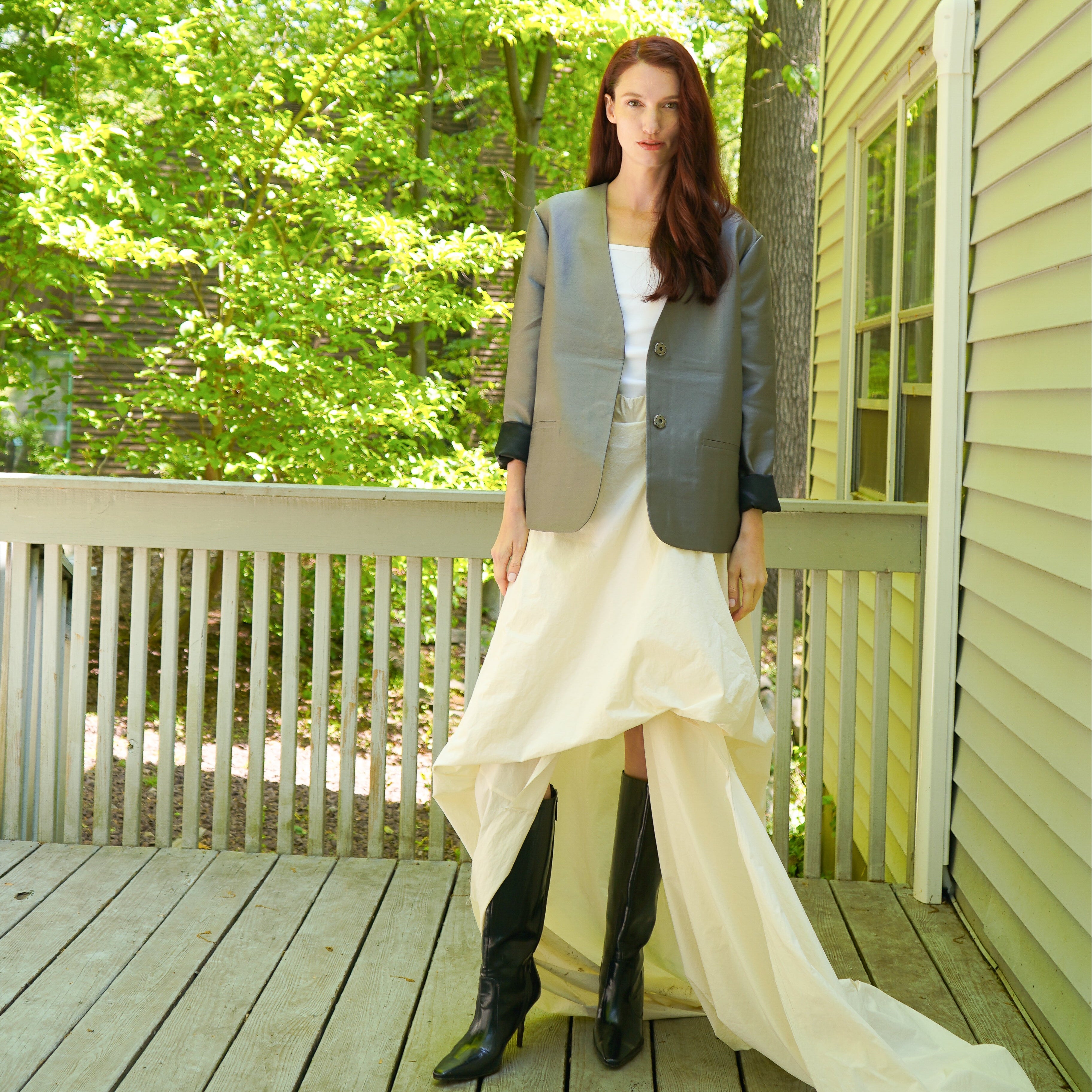 Hazel satin jacket detail — women's sleek structured outerwear close-up
