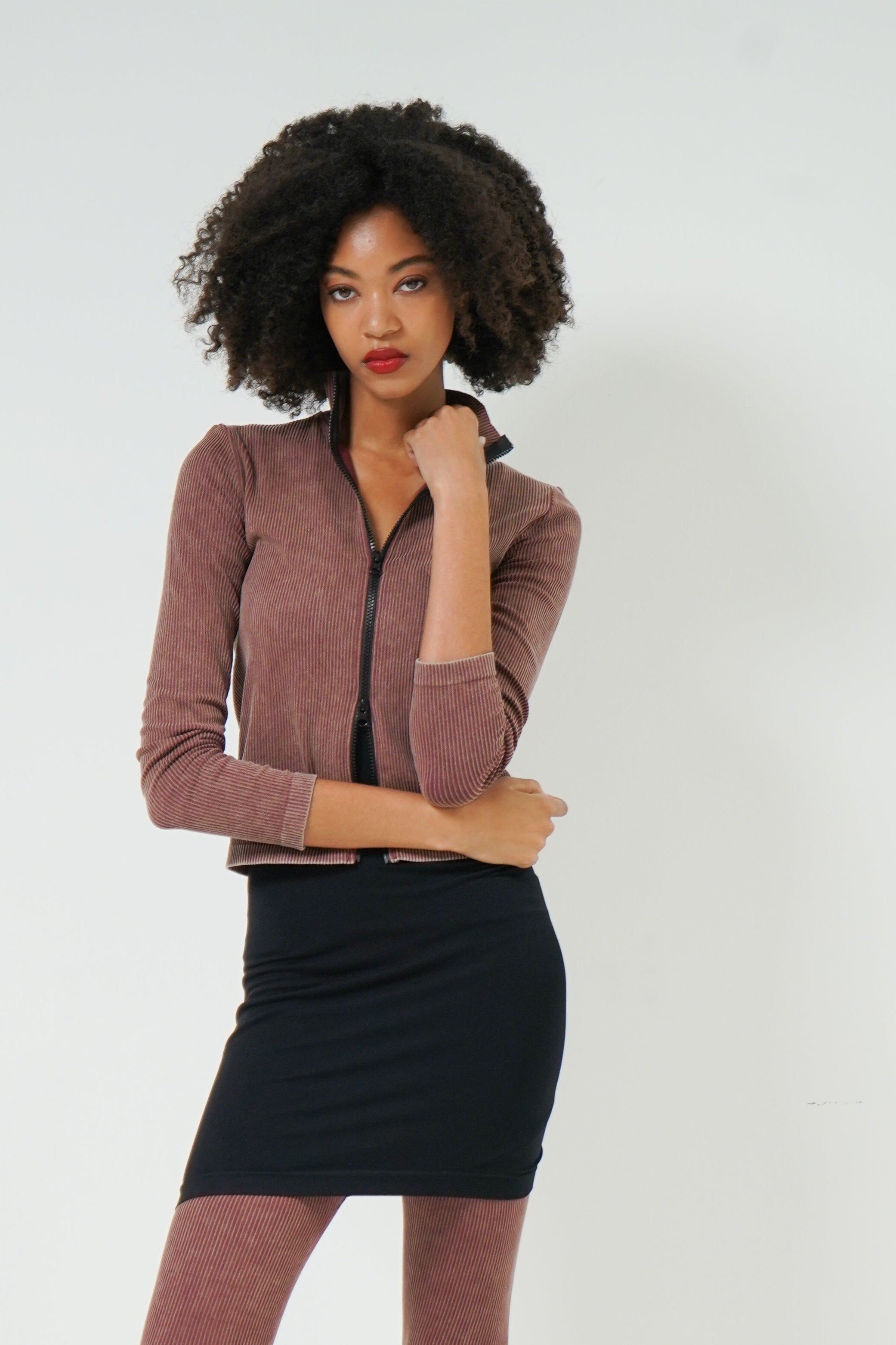 Lara top zip front detail — women's seamless rib knit close-up
