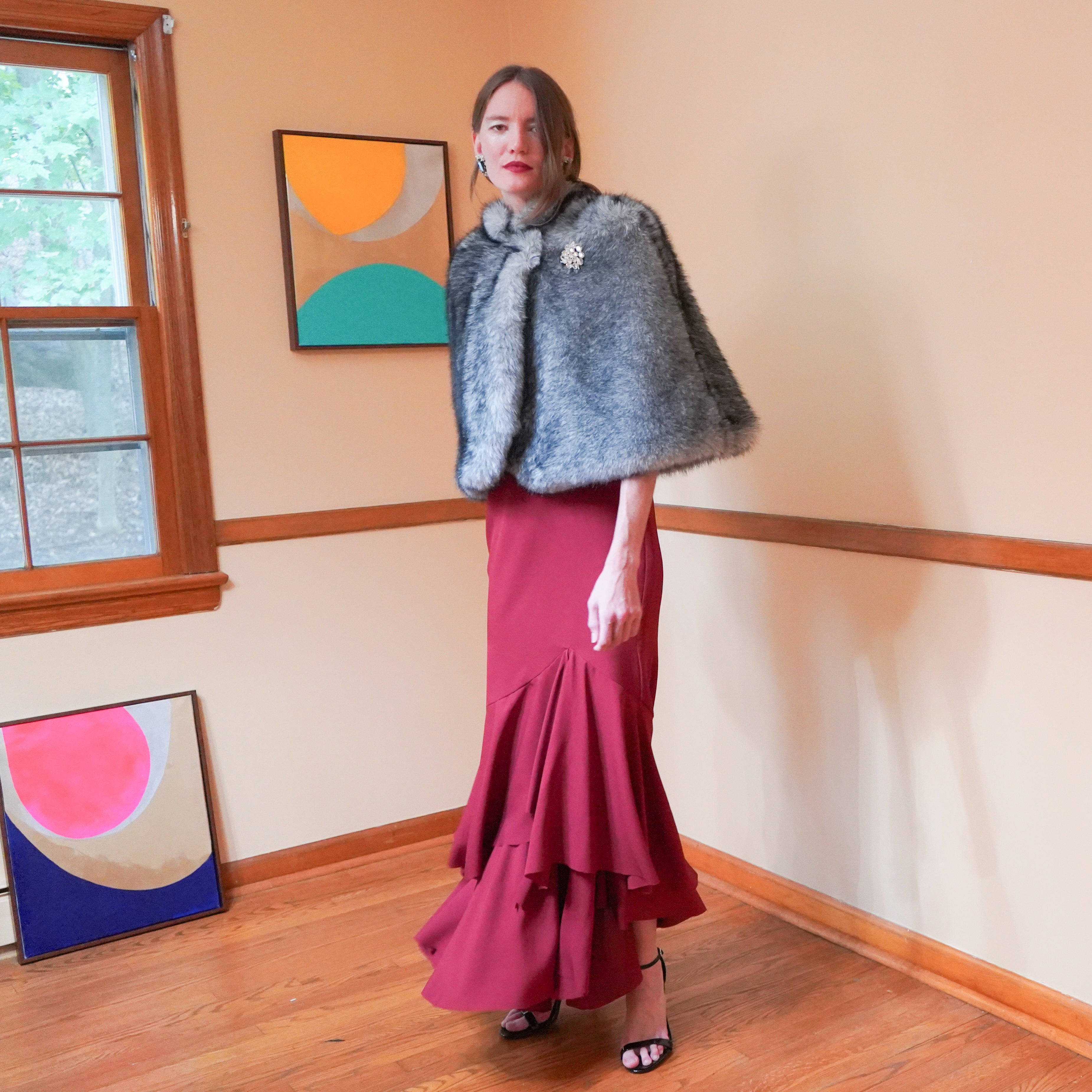 Meissa faux fur capelet over Capela maxi dress with vintage brooch