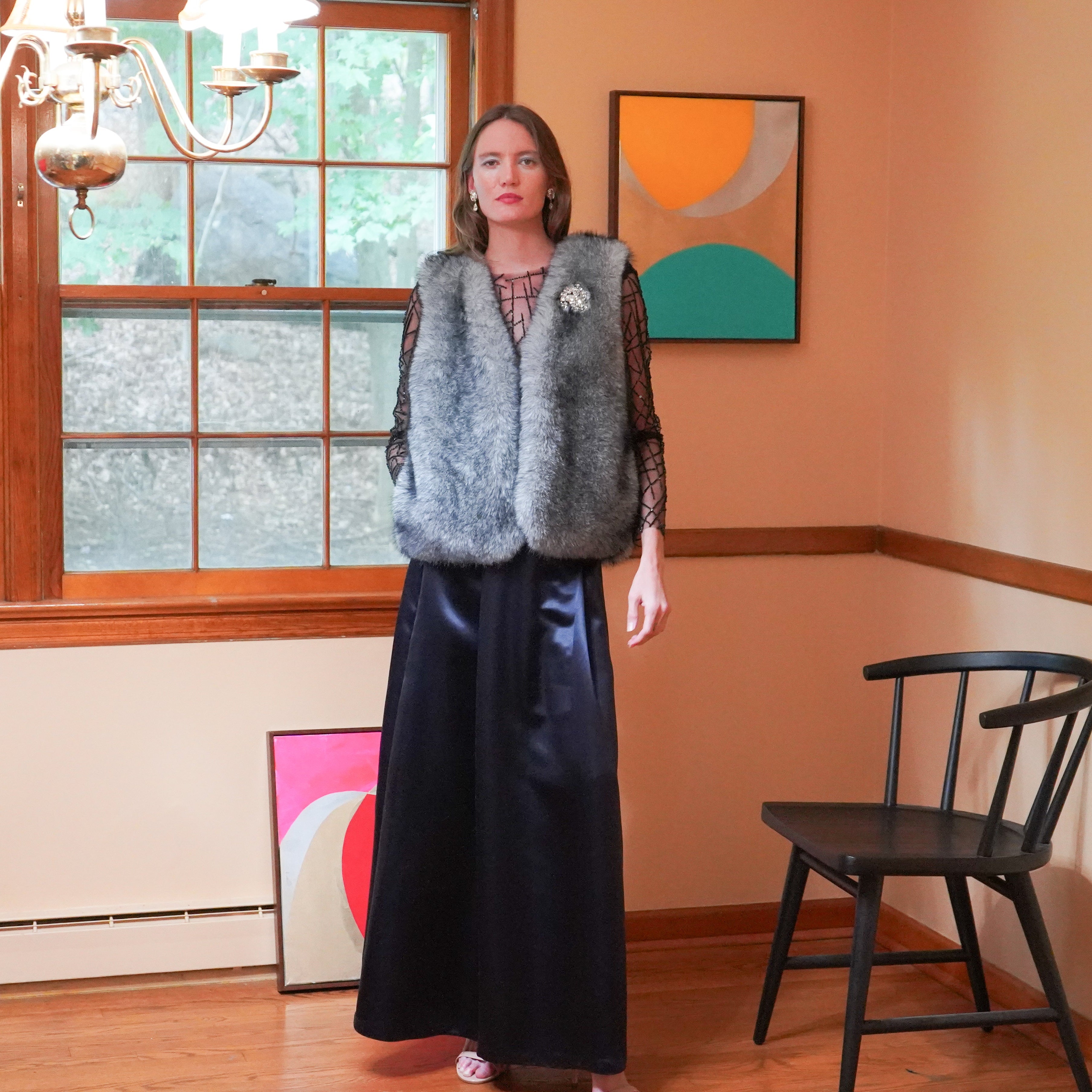 Mimosa faux fur vest over Scarlett beaded mesh top and Izar maxi silk charmeuse skirt