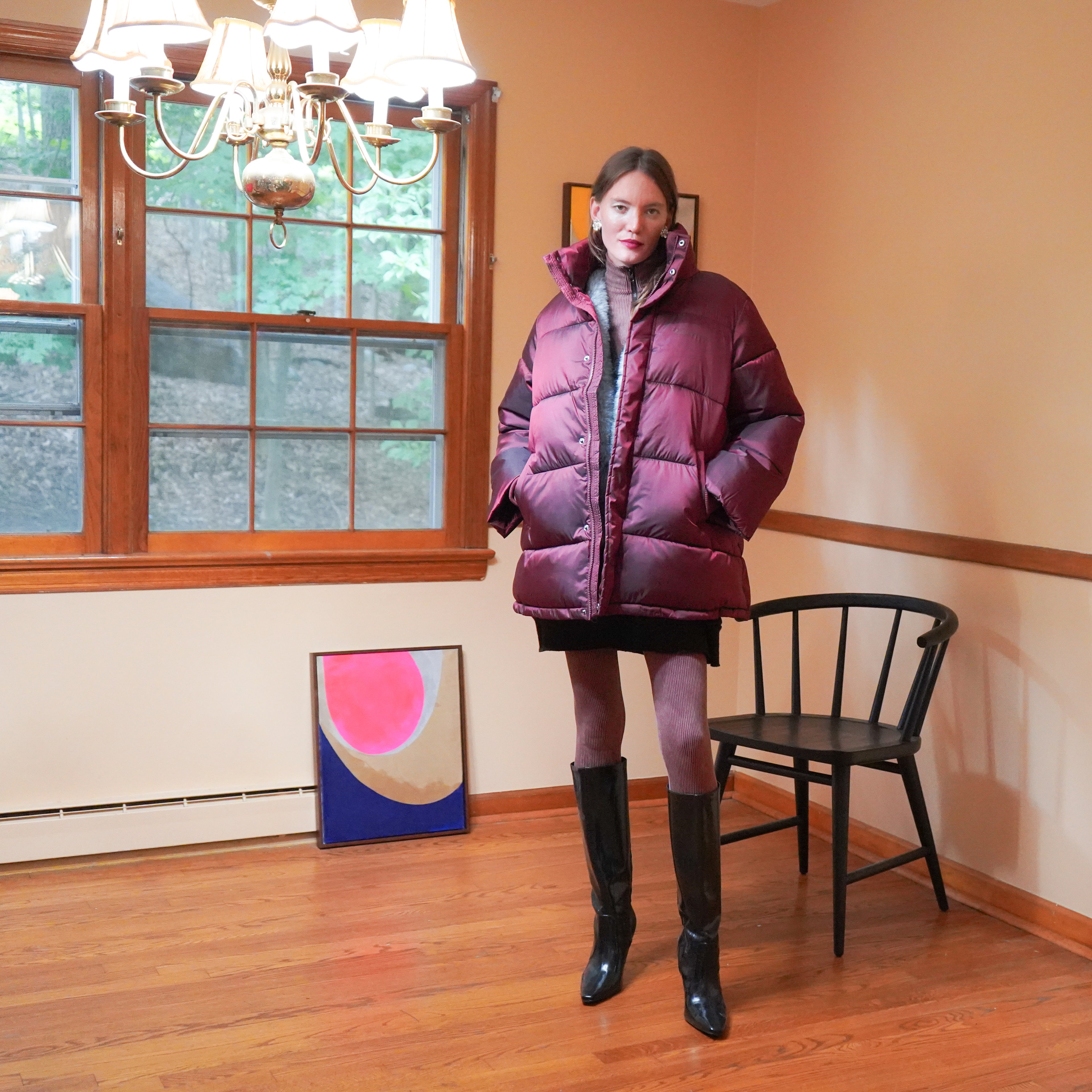 Quilted puffer coat in Maroon over fur vest and wool tunic, maroon seamless zip front top and matching leggings